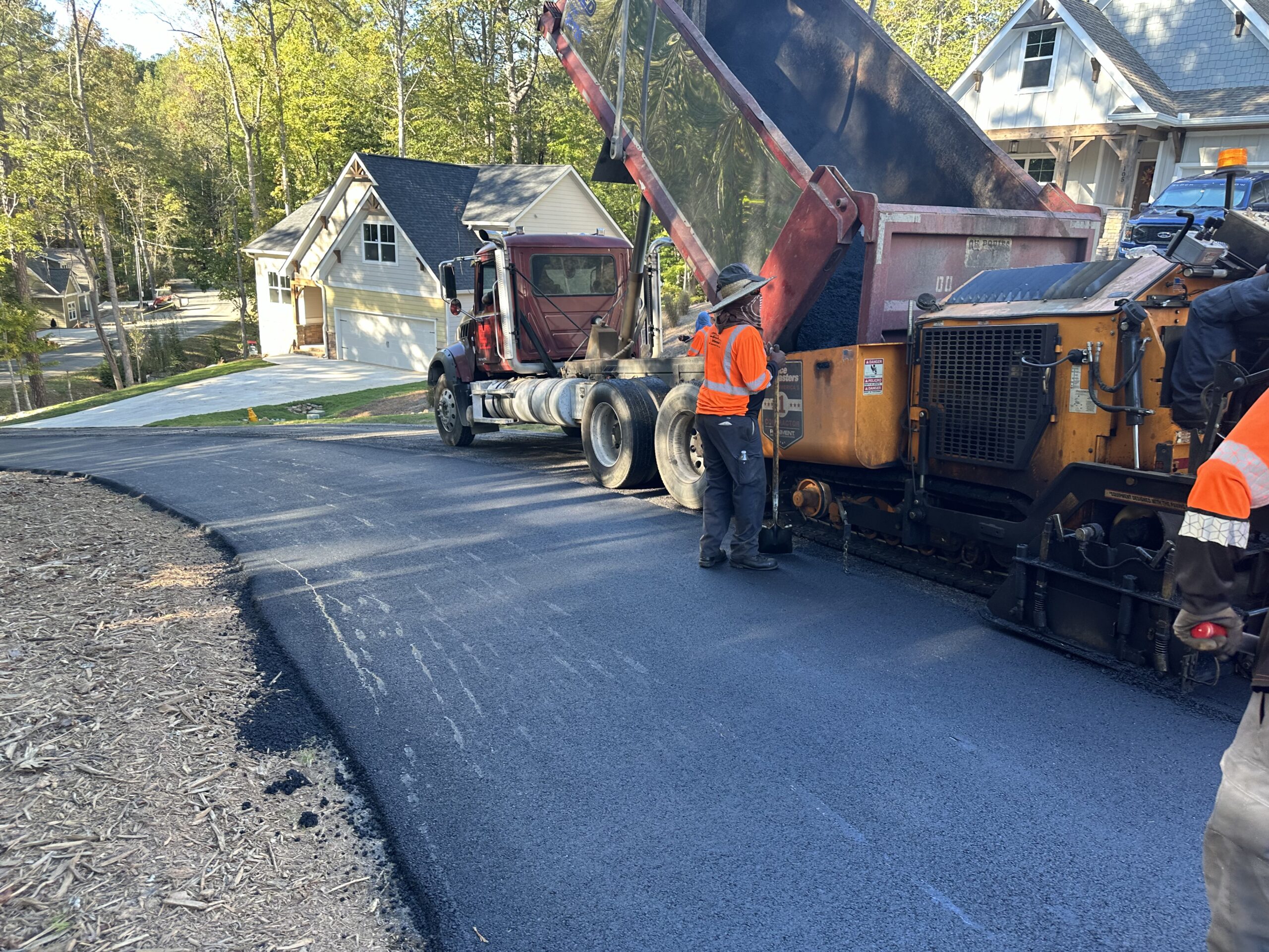 Curious On How an Atlanta Asphalt Paving Machine Works?