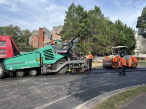 Decision Criteria for Commercial Asphalt Overlay versus Full Repaving